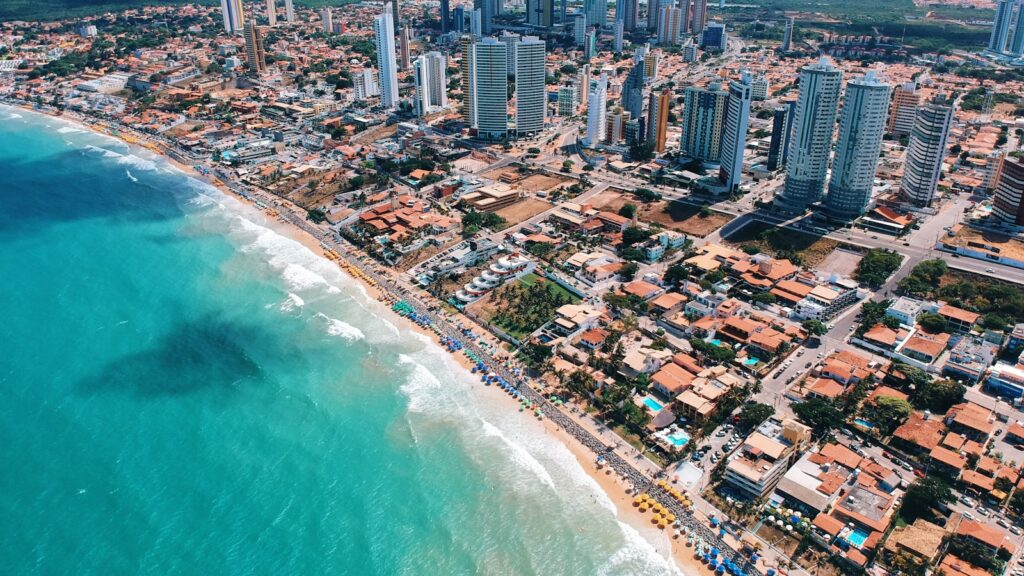 Tropical beach coastline in Brazil with blue ocean and clear skies
